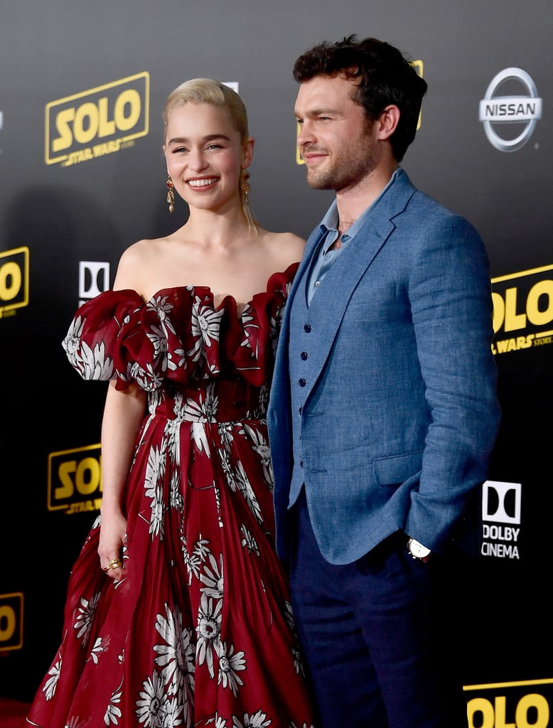 The LA premiere of Solo: A Star Wars Story went down on Thursday night, and you better believe the cast showed up in style. Donald Glover, Alden Ehrenreich, Emilia Clarke, Phoebe Waller-Bridge, Paul Bettany, and Joonas Suotamo all turned heads on the red carpet, while Thandie Newton was accompanied by RuPaul. To make matters even more exciting, Chewbacca even made a special appearance, as well as Sofia Vergara and Joe Manganiello.
Solo: A Star Wars Story doesn't hit theaters until May 25, but luckily, a new batch of beautiful photos were recently released to hold you over until then. Read on to see more pictures from the star-studded premiere!