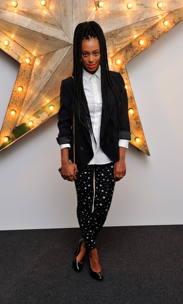 For a July 2011 evening event, Solange paired Dolce & Gabbana's star-print pants with a polka-dot button-down blouse from the brand. Her sharp blazer and mile-long braids only added to the hip factor. For a July 2011 evening event, Solange paired Dolce & Gabbana's star-print pants with a polka-dot button-down blouse from the brand. Her sharp blazer and mile-long braids only added to the hip factor.