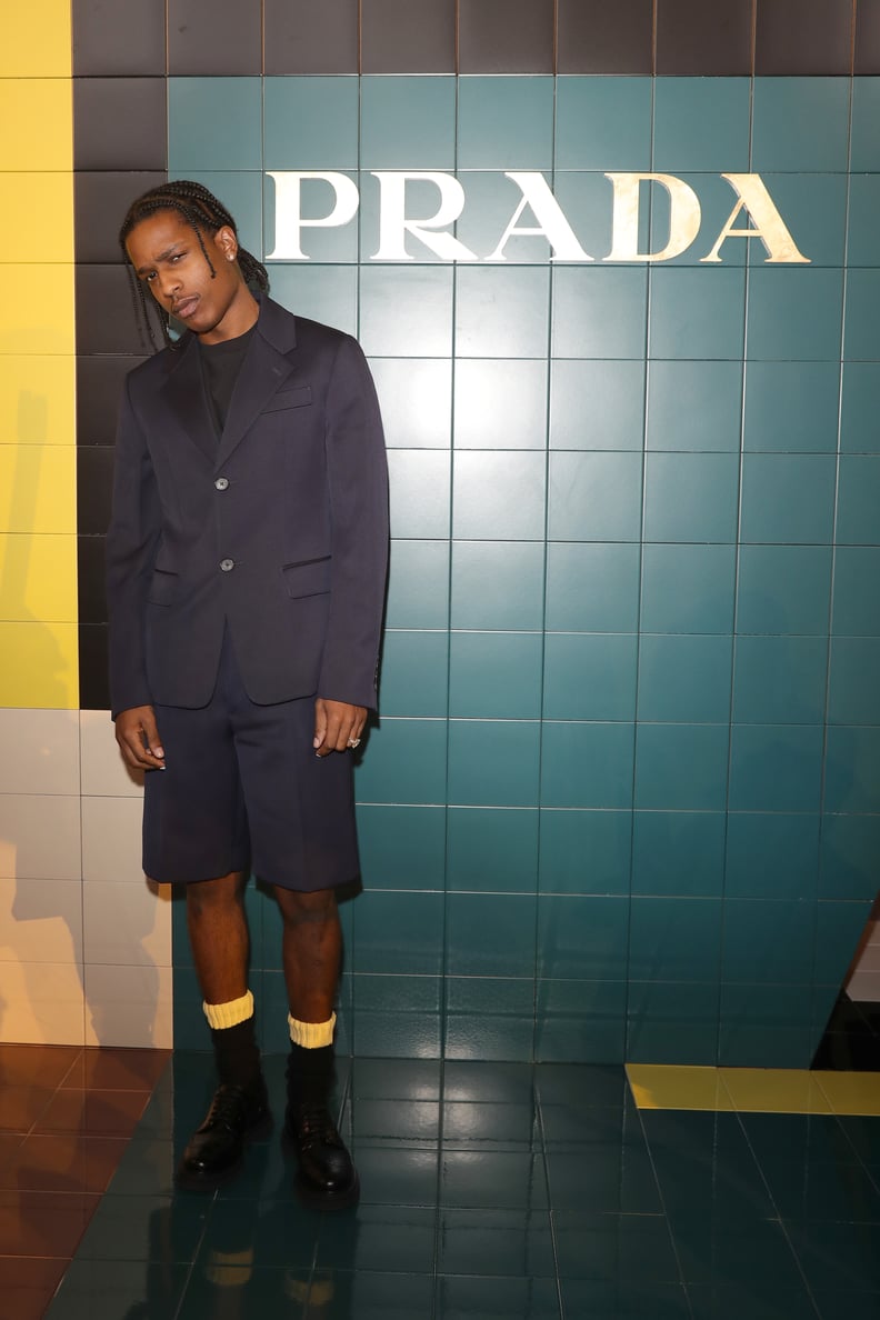 Wearing a Prada Jacket and Bermuda Shorts