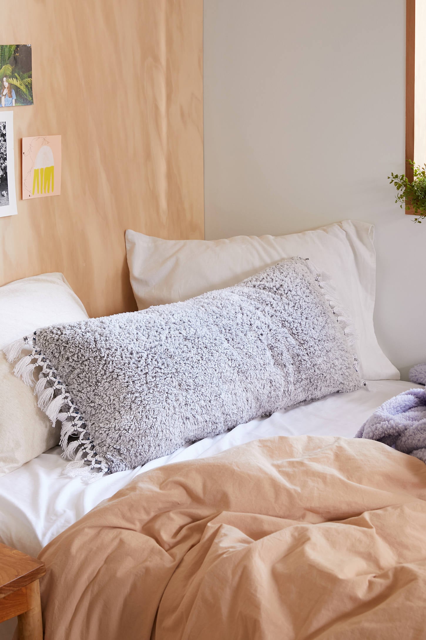 Amped Fleece Fringed Body Pillow 45 Cozy Products That Ll Make