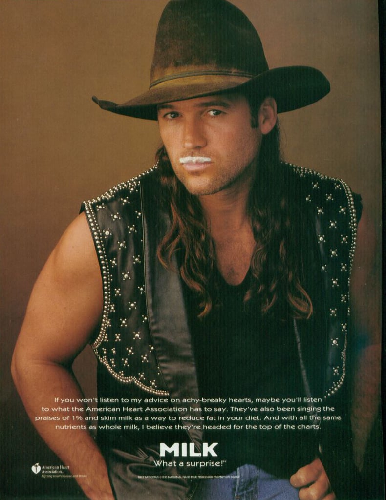 Miley Cyrus's dad, Billy Ray Cyrus, rocked a leather vest and long locks with his mustache.