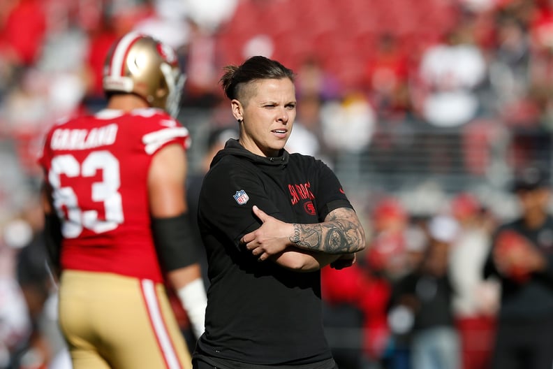 SANTA CLARA, CALIFORNIA - DECEMBER 15: San Francisco 49ers offensive assistant coach Katie Sowers looks on during the warm up before the game against the Atlanta Falcons at Levi's Stadium on December 15, 2019 in Santa Clara, California. (Photo by Lachlan 
