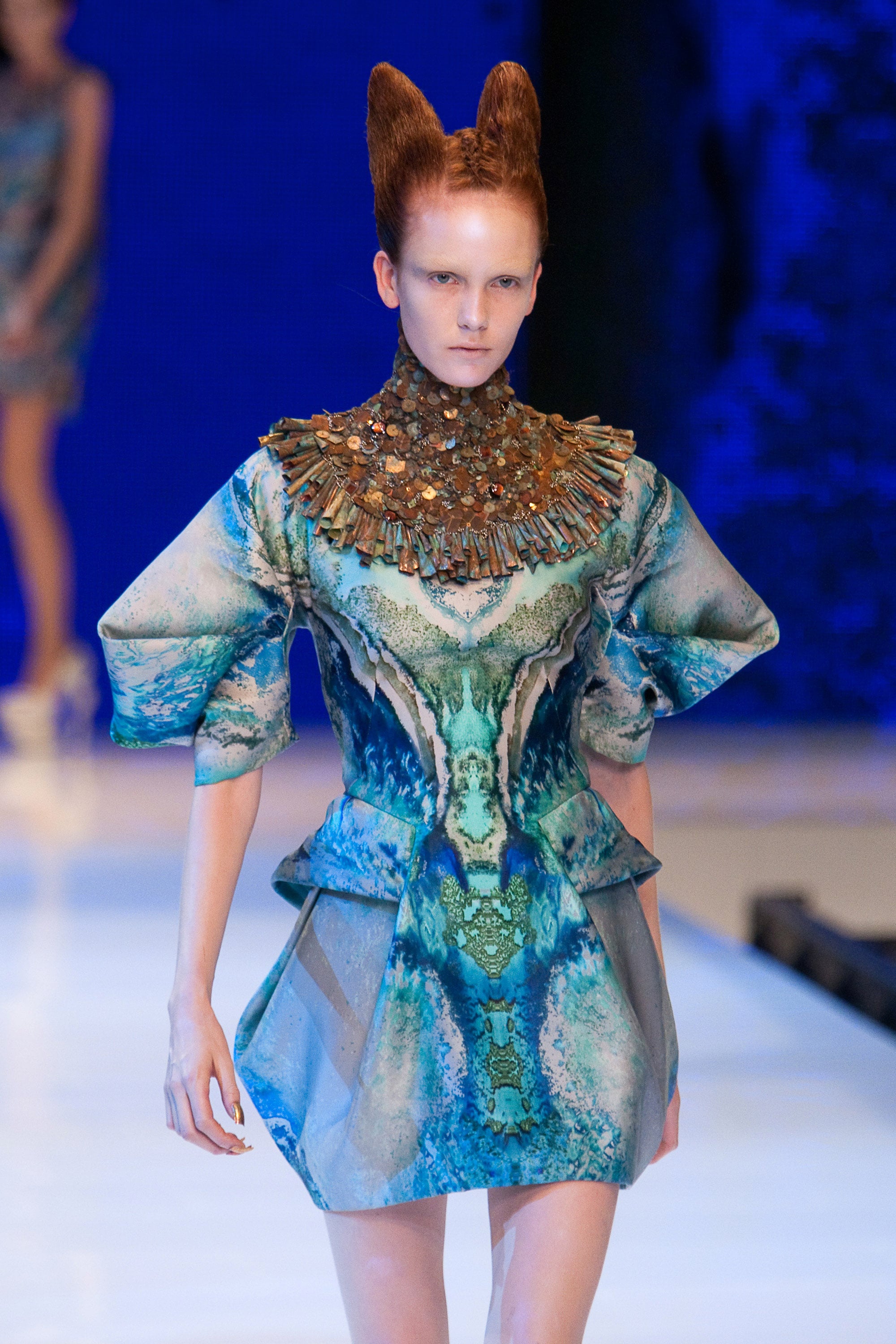 PARIS - OCTOBER 06: A model walks the runway during Alexander McQueen Pret a Porter show as part of the Paris Womenswear Fashion Week Spring/Summer 2010 at Palais Omnisports de Bercy on October 6, 2009 in Paris, France. (Photo by Victor Boyko/Getty Images)