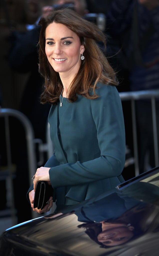 Kate's diamond drop earrings played up her glow.