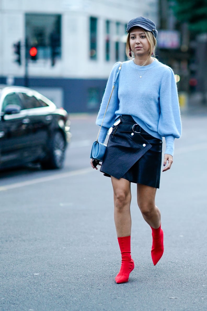 Throw on with a sweater, miniskirt, and ankle boots.