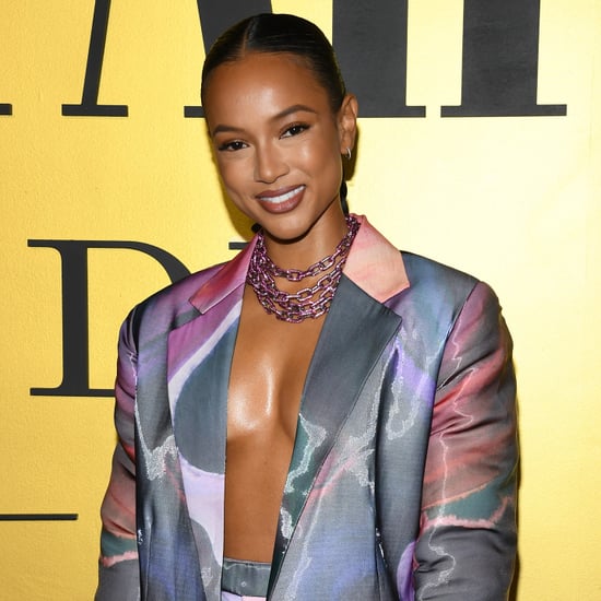 Karrueche Tran Goes Shirtless Under Blazer at Vanities Party