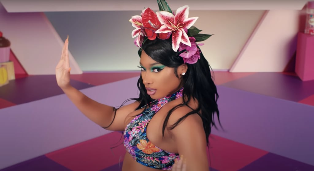 Megan opened the video wearing a matching floral two-piece ensemble.