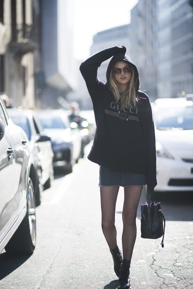 Wear Your Favorite Sweatshirt With a Denim Skirt and Fishnet Tights