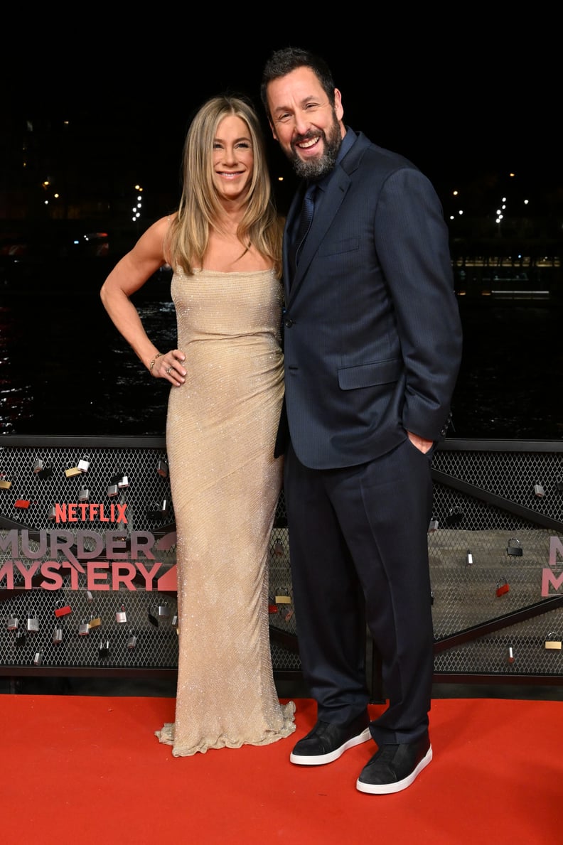 Adam Sandler and Jennifer Aniston at a "Murder Mystery 2" Photocall in 2023