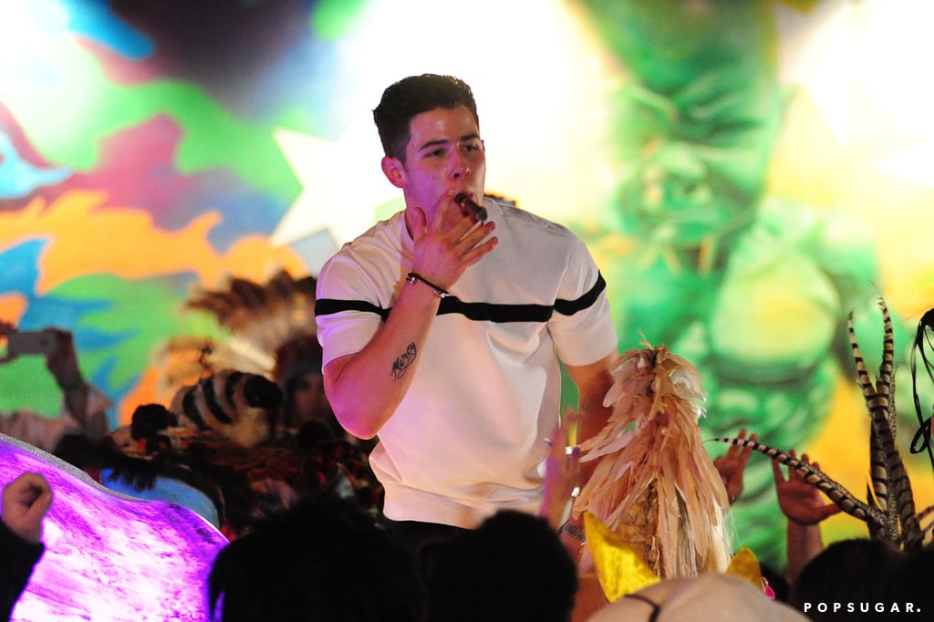 Nick Jonas seemed to be smoking a cigar while reportedly filming the music video for "Chains" in Miami on Saturday.