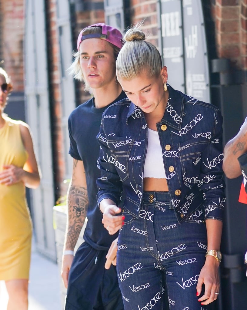 Hailey was spotted out with Justin in a full on Versace look on July 5 in NYC, sporting her stackable diamond band on her left ring finger.