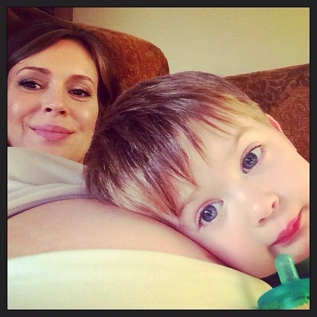 Milo Langdon took a rest on Alyssa Milano's pregnant belly.
Source: Instagram user milano_alyssa