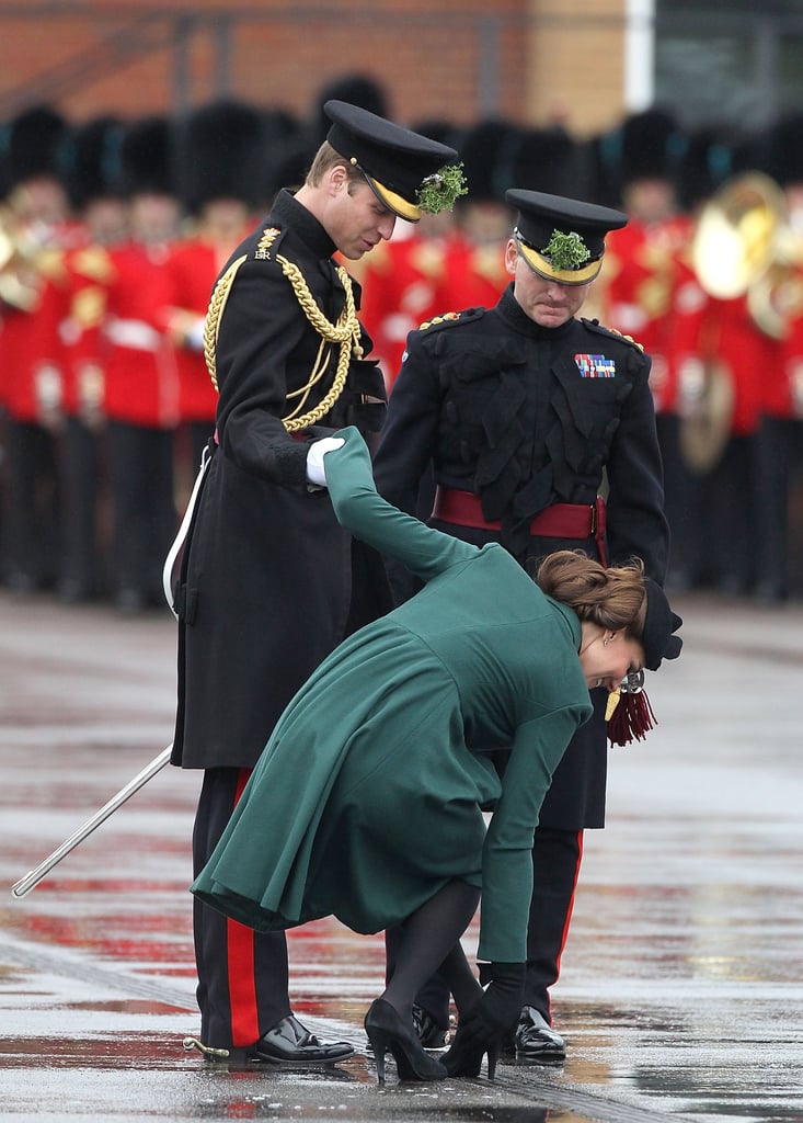 Prince William was quite the gentleman helping Kate Middleton with her shoe in March 2013 in England.