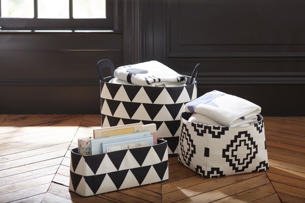On how they keep kids' rooms looking polished instead of a construction zone of toys and spills: "We are big on cute storage bins that hold everything from toys to blankets. Using wall space efficiently is another great way to get the mess off the floor. Hooks and shelves can provide ample storage space and serve double duty as wall decor."