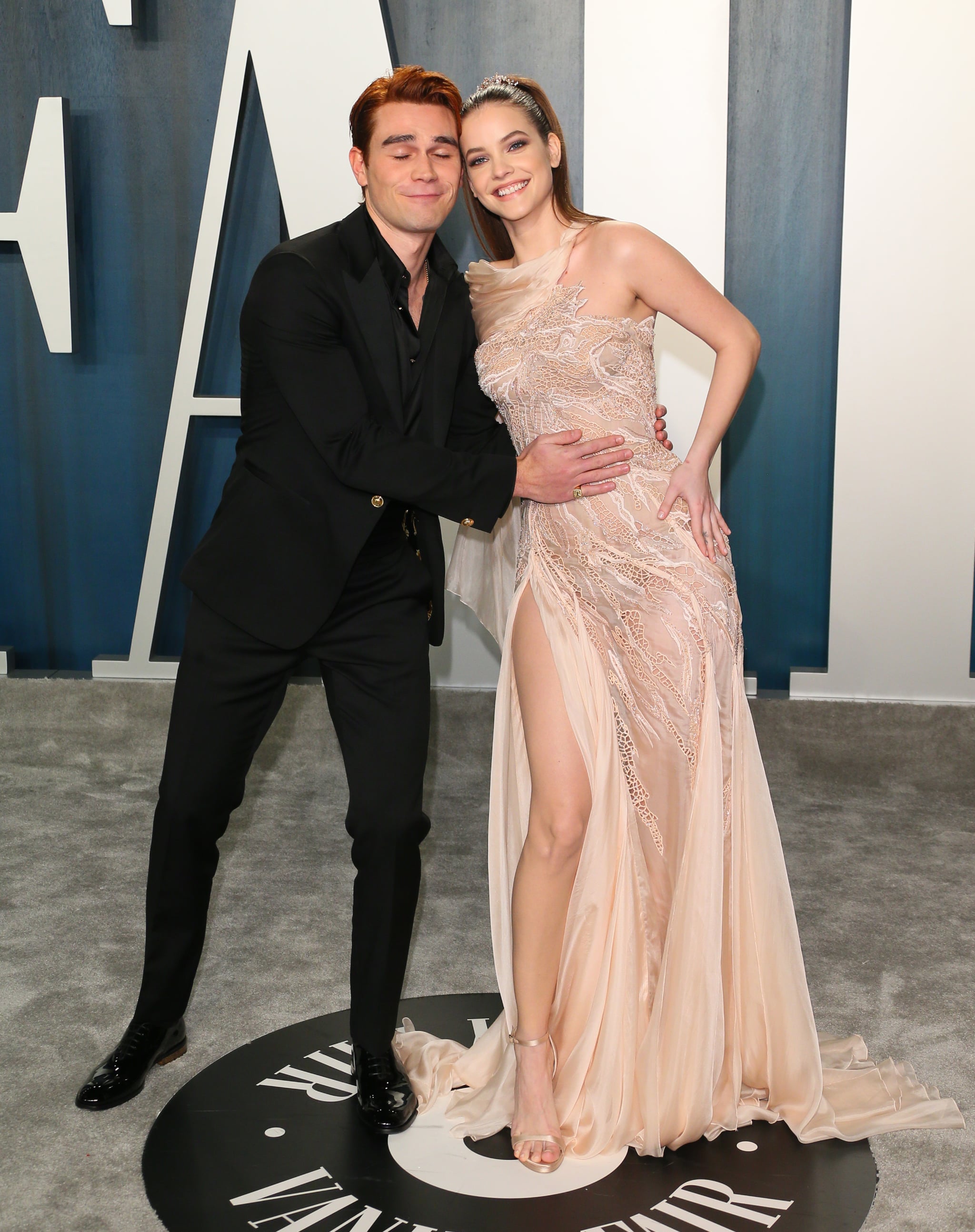 New Zealand actor KJ Apa and French model Clara Berry attend the 2020 Vanity Fair Oscar Party following the 92nd Oscars at The Wallis Annenberg Centre for the Performing Arts in Beverly Hills on February 9, 2020. (Photo by Jean-Baptiste Lacroix / AFP) (Photo by JEAN-BAPTISTE LACROIX/AFP via Getty Images)