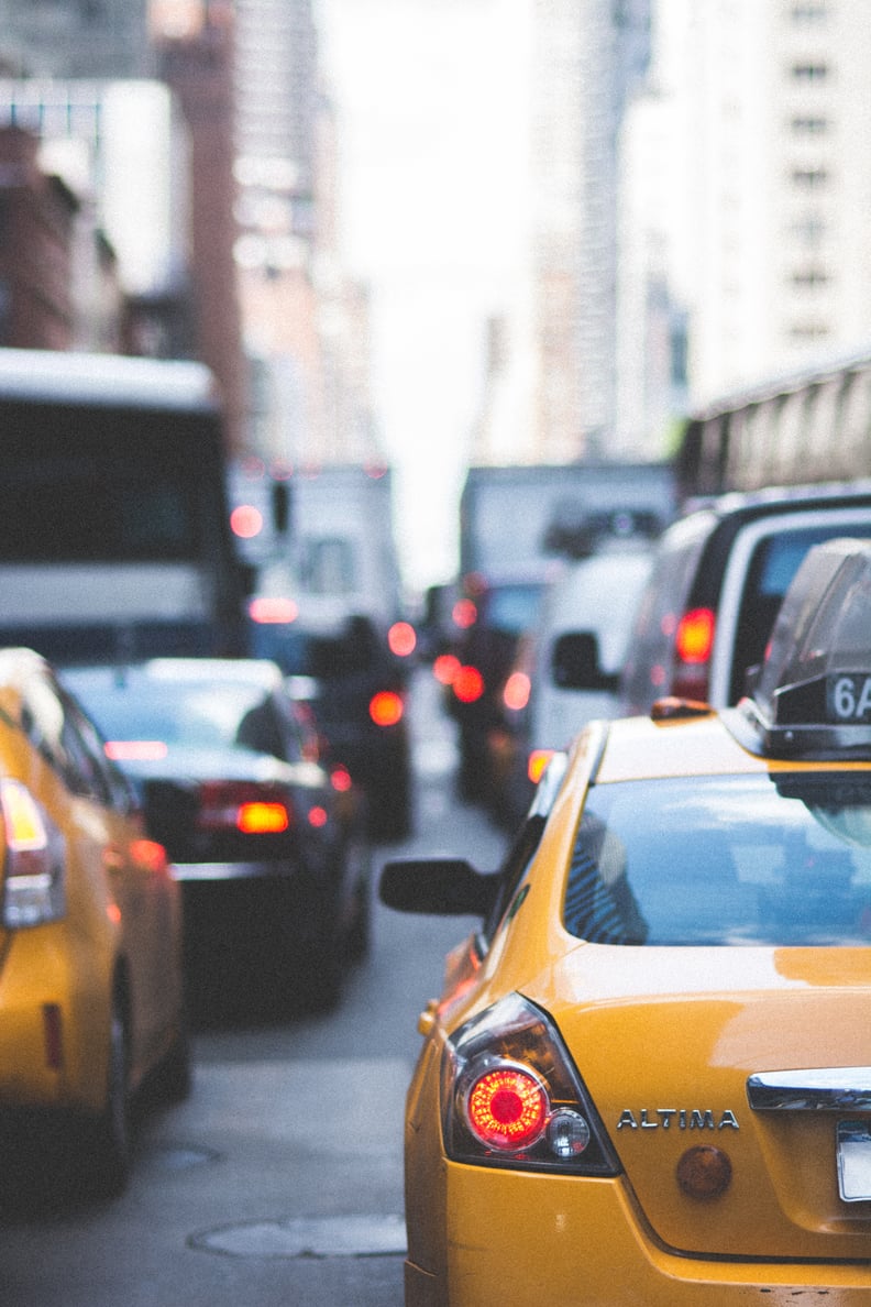 Let a car merge in front of you in a traffic jam.