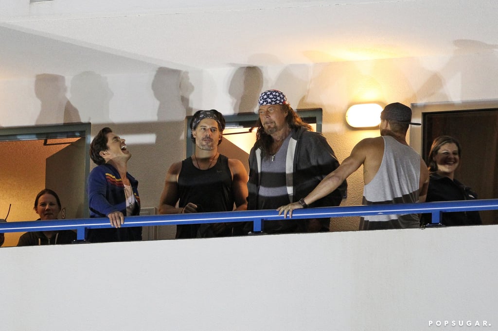 The boys looked down from a railing.