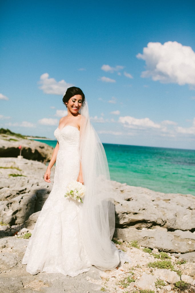 Take a Solo Shot With the Ocean Behind You to Highlight Your Dress