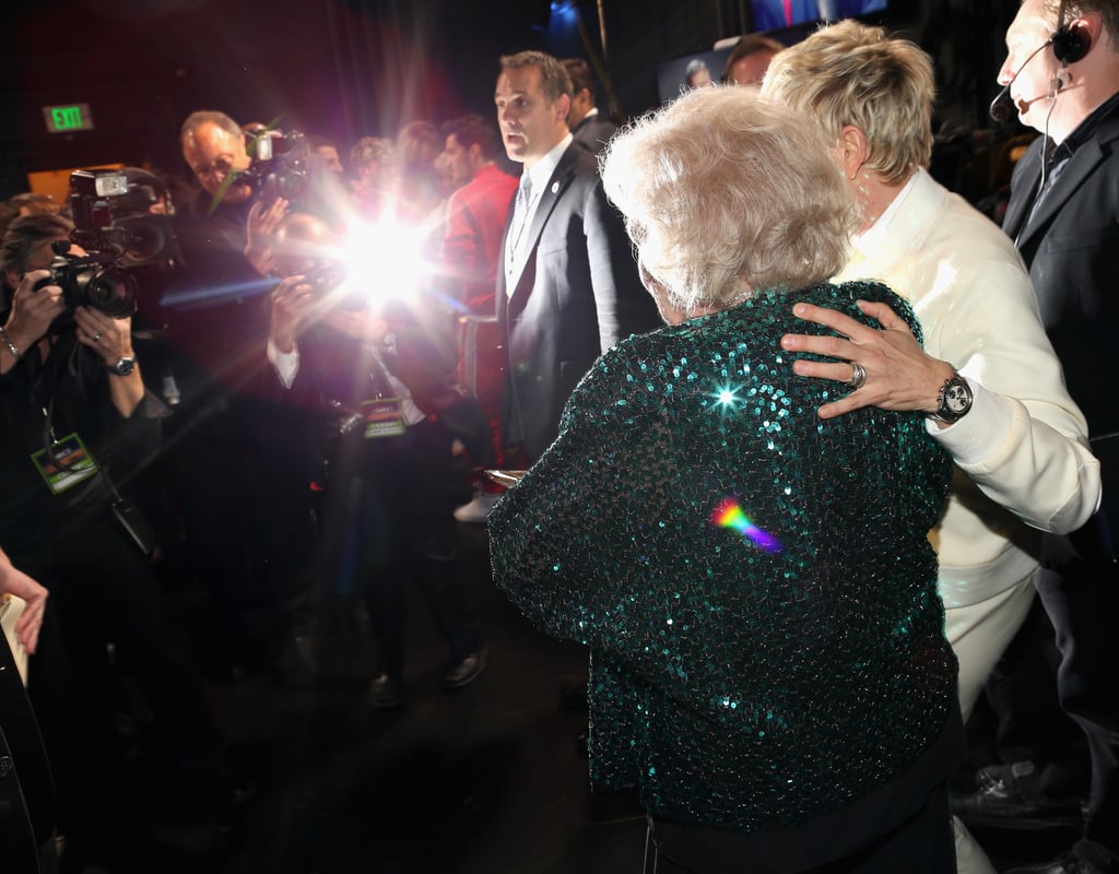 Ellen DeGeneres and Betty White were surrounded by flashbulbs.