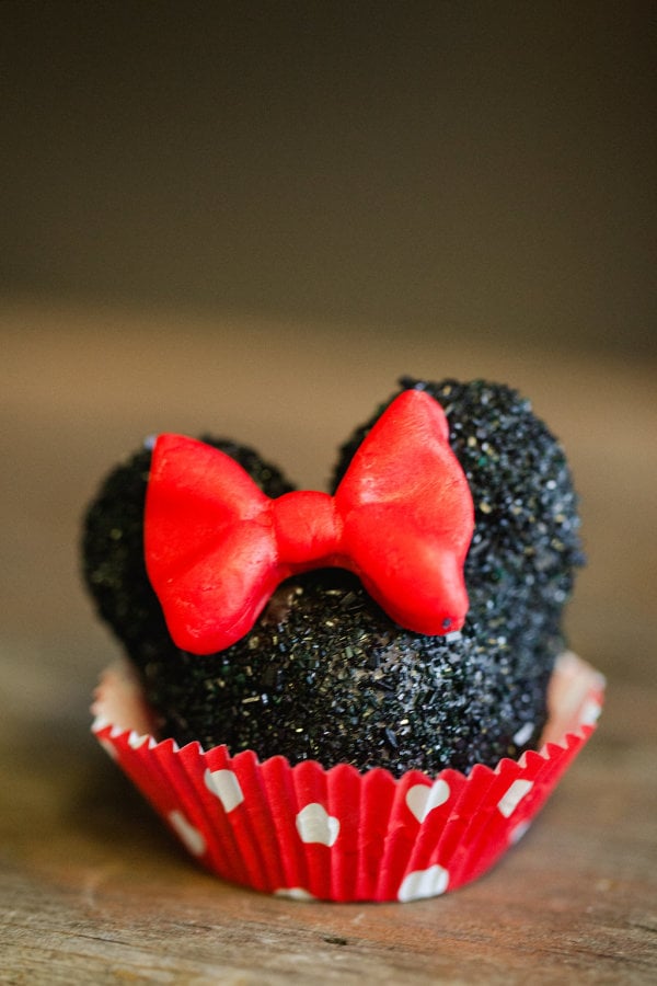 Minnie Mouse cake pops were taken off the stick and placed in cupcake liners so they'd be easier for the kids to eat.