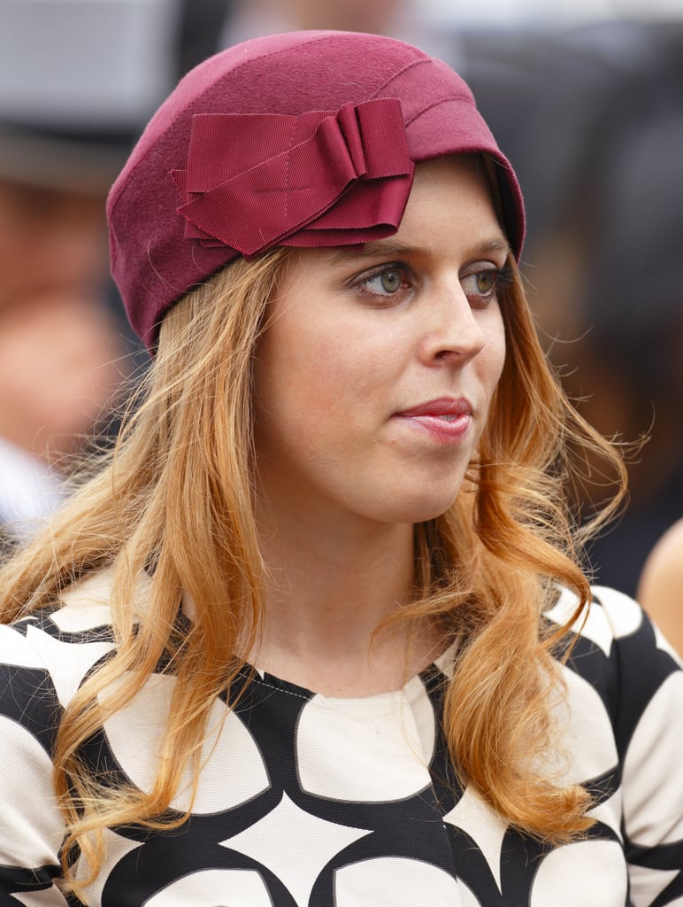 Beatrice in a Karen Henriksen plum cloche at the Epsom Derby 2013.