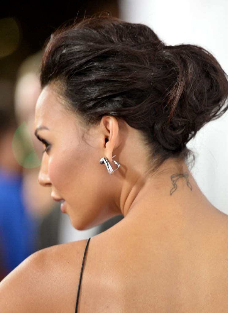 When Naya pulls her hair up, a little bow is exposed to the world.