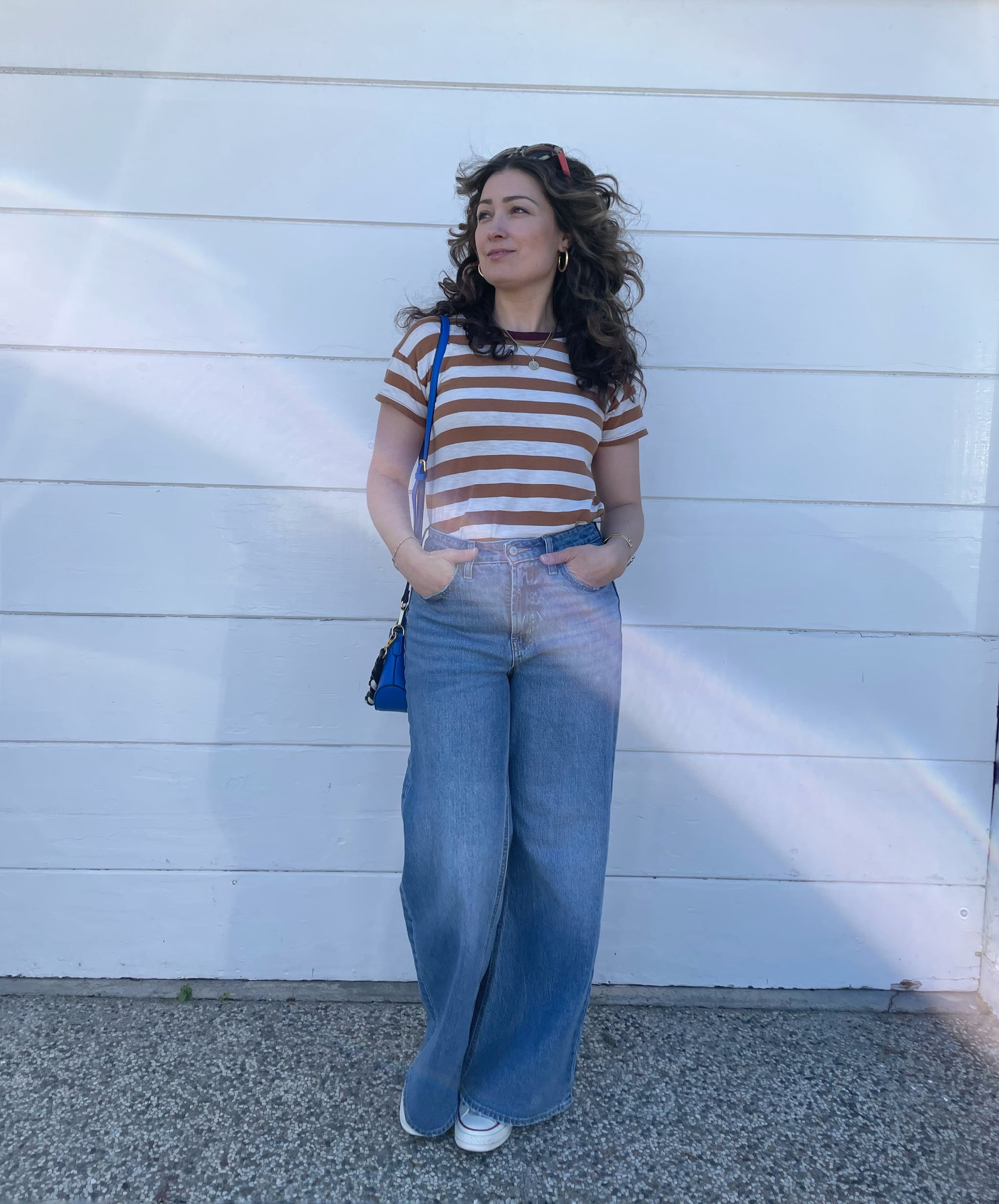 woman wearing Old Navy's high-waisted, wide-leg jeans