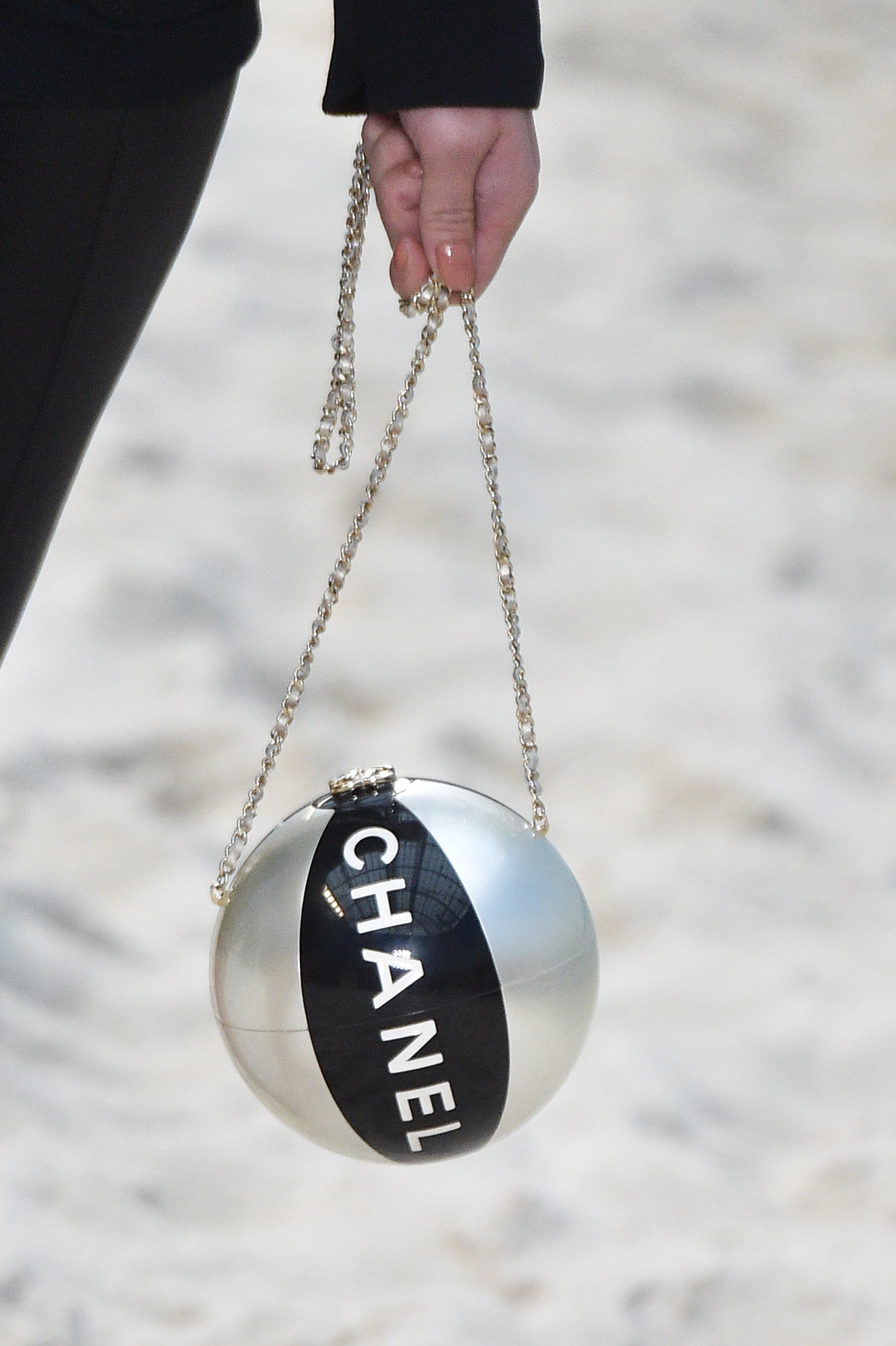 Chanel Took Its Spring 2019 Collection to the Beach, Including Terrycloth  Flap Bags and Beach Ball Clutches - PurseBlog