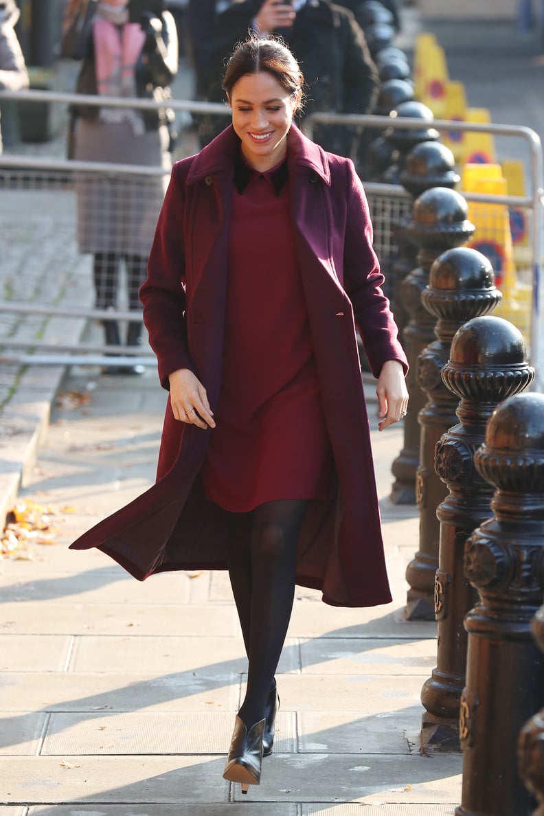 Meghan Markle Fall Outfit Idea: A Burgundy Dress and Matching Coat