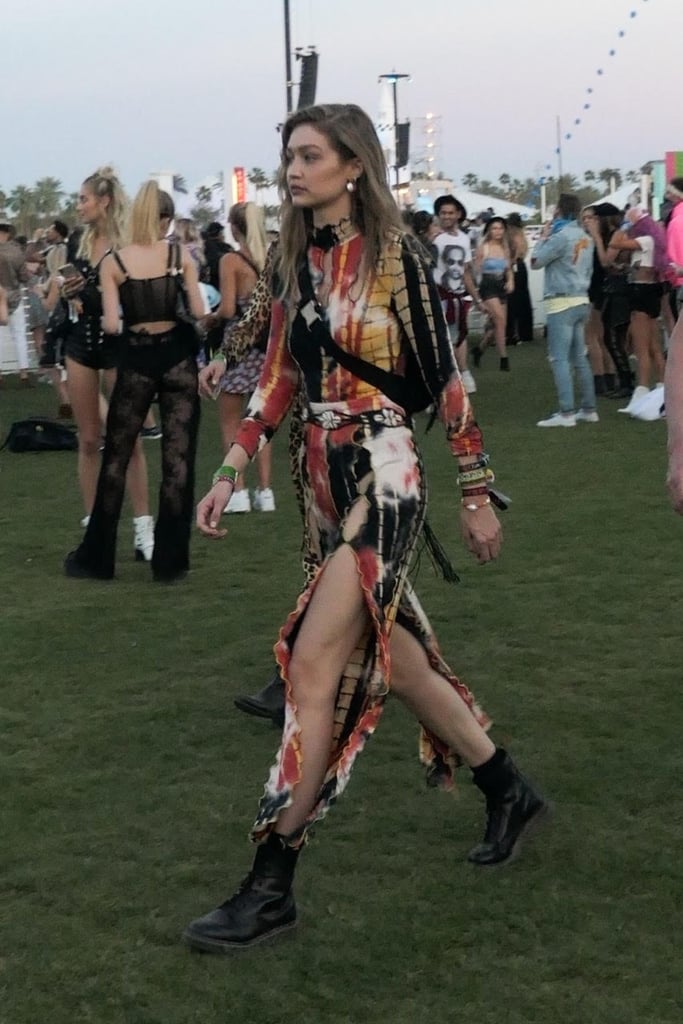 Gigi Hadid also gave the tie-dye trend a try, wearing a multicolored set with lace-up combat boots, a Mango seashell belt, and loads of jewellery. This look is what we like to call Deadhead-chic.