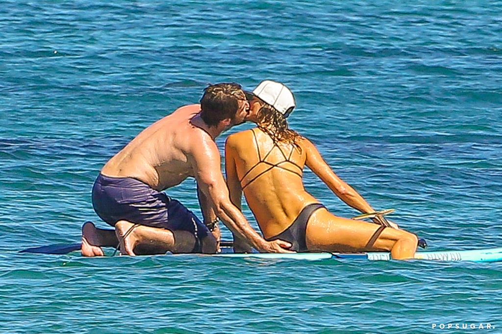 Gerard Butler grabbed a handful of his girlfriend's butt while out paddle boarding in Malibu, CA in September 2014.