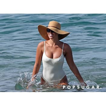 Natasha Oakley Wearing a White Swimsuit POPSUGAR Fashion