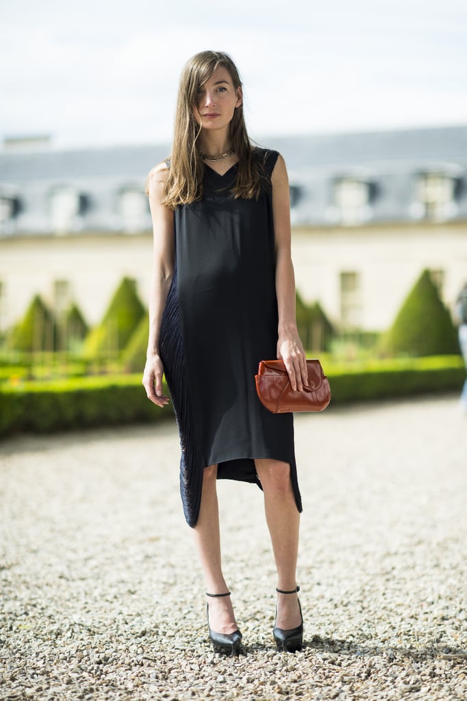 An eclectically chic approach in a fringed black dress and statement jewels.
Source: Le 21ème | Adam Katz Sinding