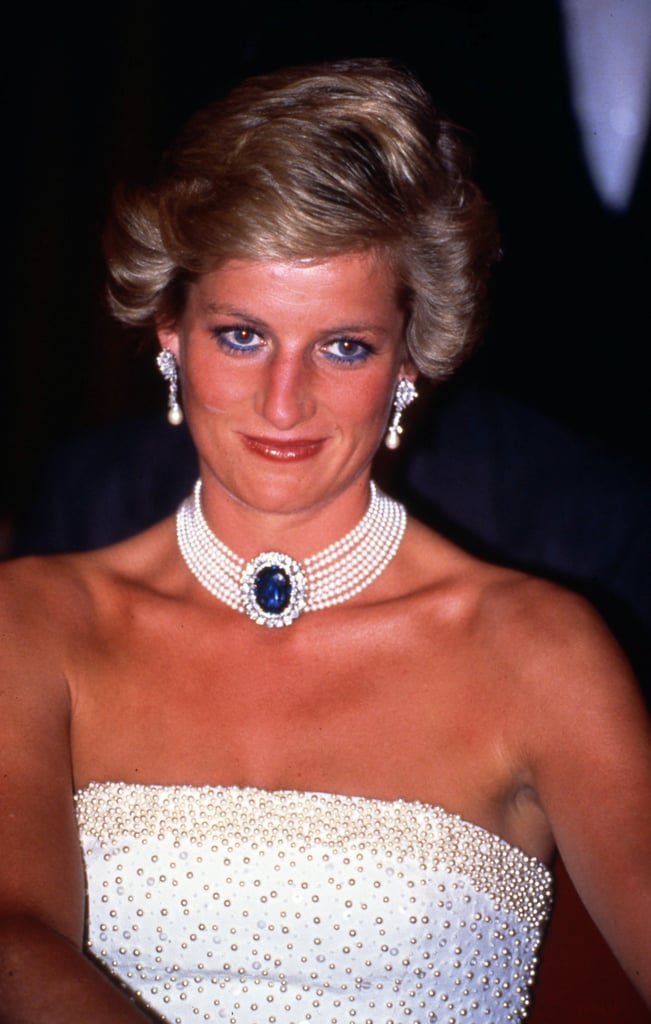 Diana flashed a sweet smile while attending a banquet in Budapest, Hungary, in May 1990.