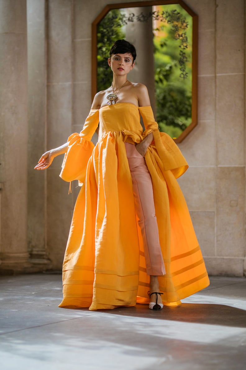 An Orange Dress Over Pants From the Rosie Assoulin Presentation During New York Fashion Week