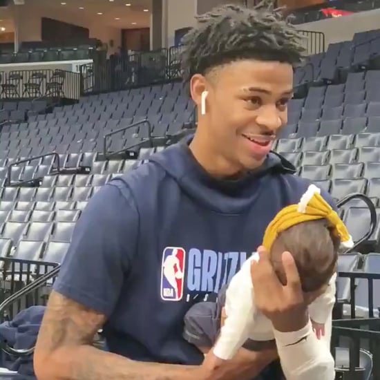 Watch This NBA Rookie Cuddle His Daughter Before a Game