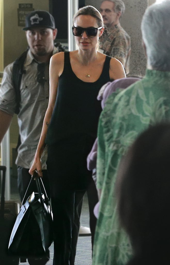 Along with black tanks and bottoms, it seemed to become a constant in her traveling wardrobe.
Photo courtesy of Saint Laurent