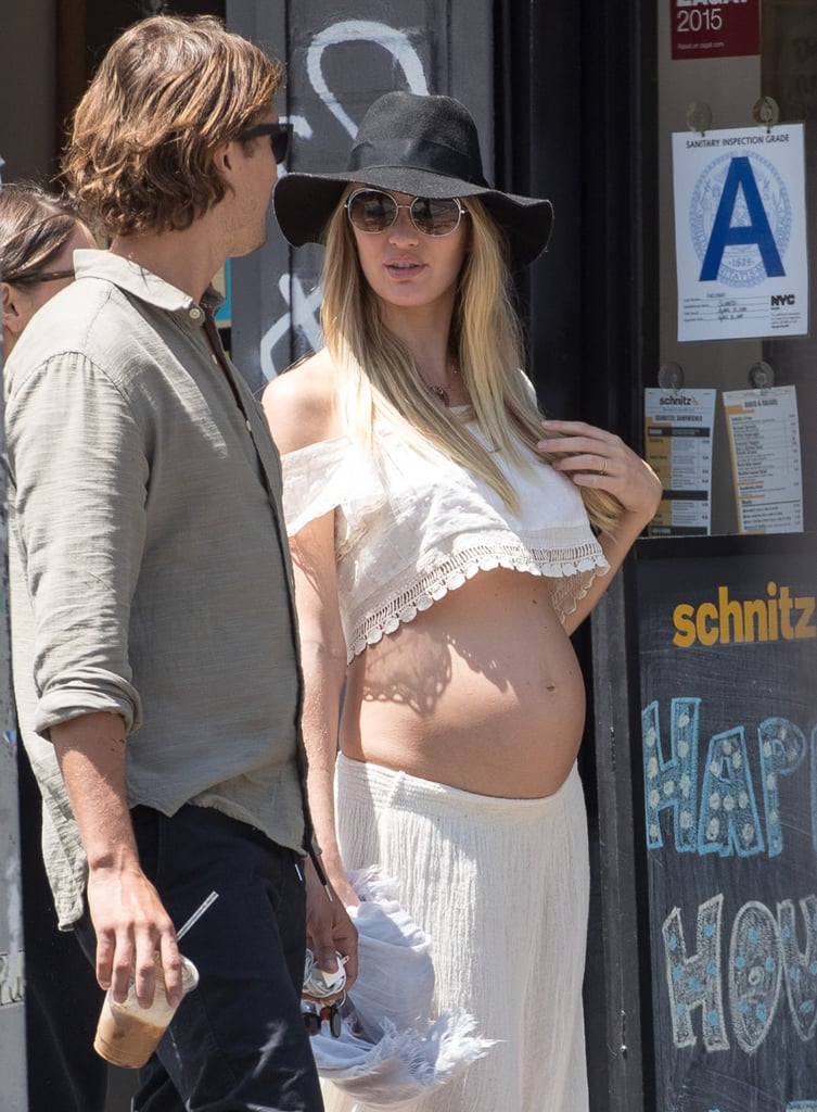 Candice Swanepoel Showing Her Baby Bump in a Crop Top