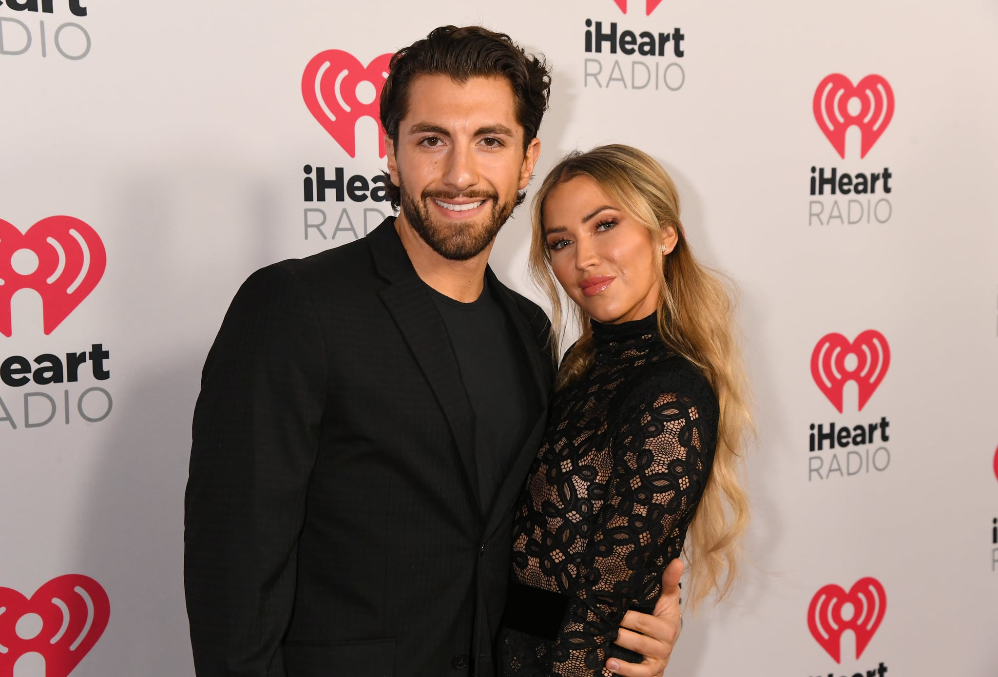 BURBANK, CALIFORNIA - JANUARY 17: (FOR EDITORIAL USE ONLY) (L-R) Jason Tartick and Kaitlyn Bristowe attend the 2020 iHeartRadio Podcast Awards at the iHeartRadio Theater on January 17, 2020 in Burbank, California. (Photo by Jeff Kravitz/FilmMagic for iHeartMedia)