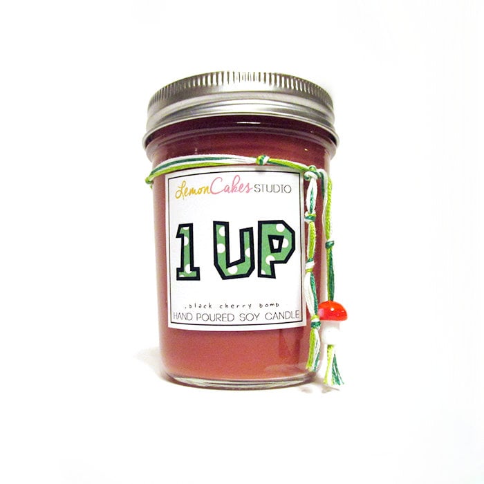 "1 Up" candle ($12) with black cherry notes