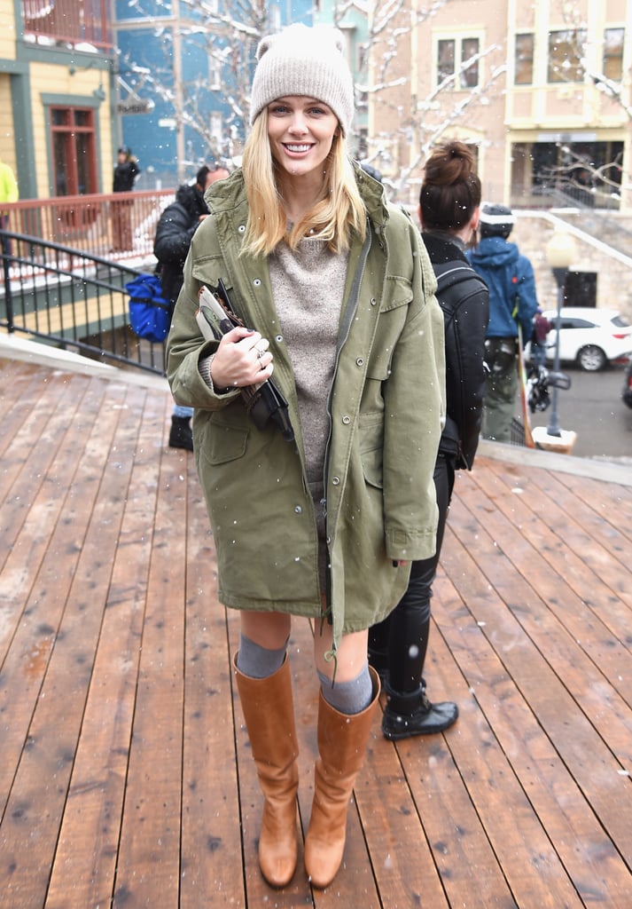 We'd happily take a page from Brooklyn Decker's easy, cool-girl Winter look — just toss an anorak over your sweater dress.
