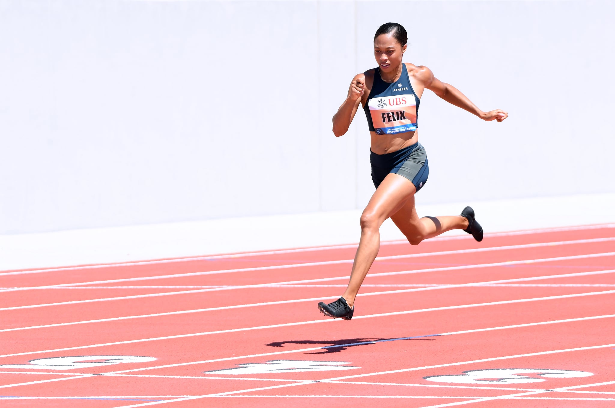 WALNUT, CA - JULY 09:  Allyson Felix crosses the finish in first place in the 150 meter dash during the Weltklasse Zurich Inspiration Games amidst the coronavirus (COVID-19) pandemic on July 09, 2020 in Walnut, California. (Photo by Harry How/Getty Images)