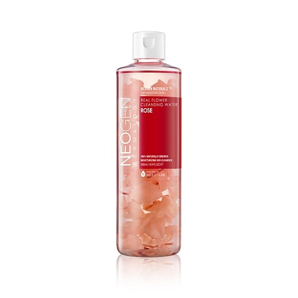 "Believe when I say this smells faintly of natural roses—it's heavenly! This is one of those all-in-one, lazy-girl beauty products that lets you swipe away stubborn makeup, cleanse your skin before a workout without water, and hydrate your thirsty face. It's as effective as it is visually stimulating, thanks to all the pretty petals suspended in the bottle."  
Neogen Cleansing Water — Rose ($22)