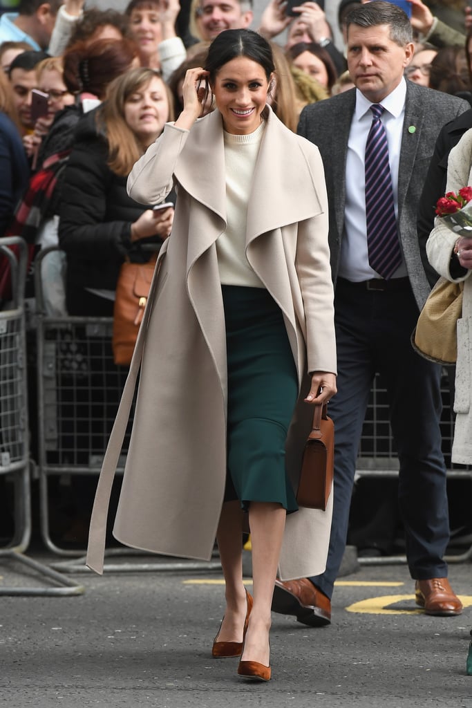 Meghan Markle Fall Outfit Idea: A Cream Sweater, Pencil Skirt, Belted Trench, and Chocolate Heels and Bag