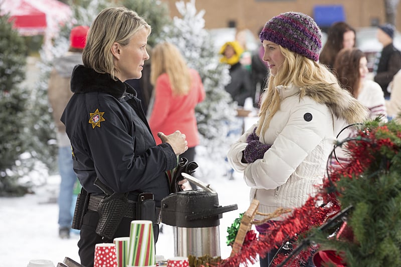 Sheriff Forbes (Marguerite MacIntyre) talks with Caroline (Candice Accola).