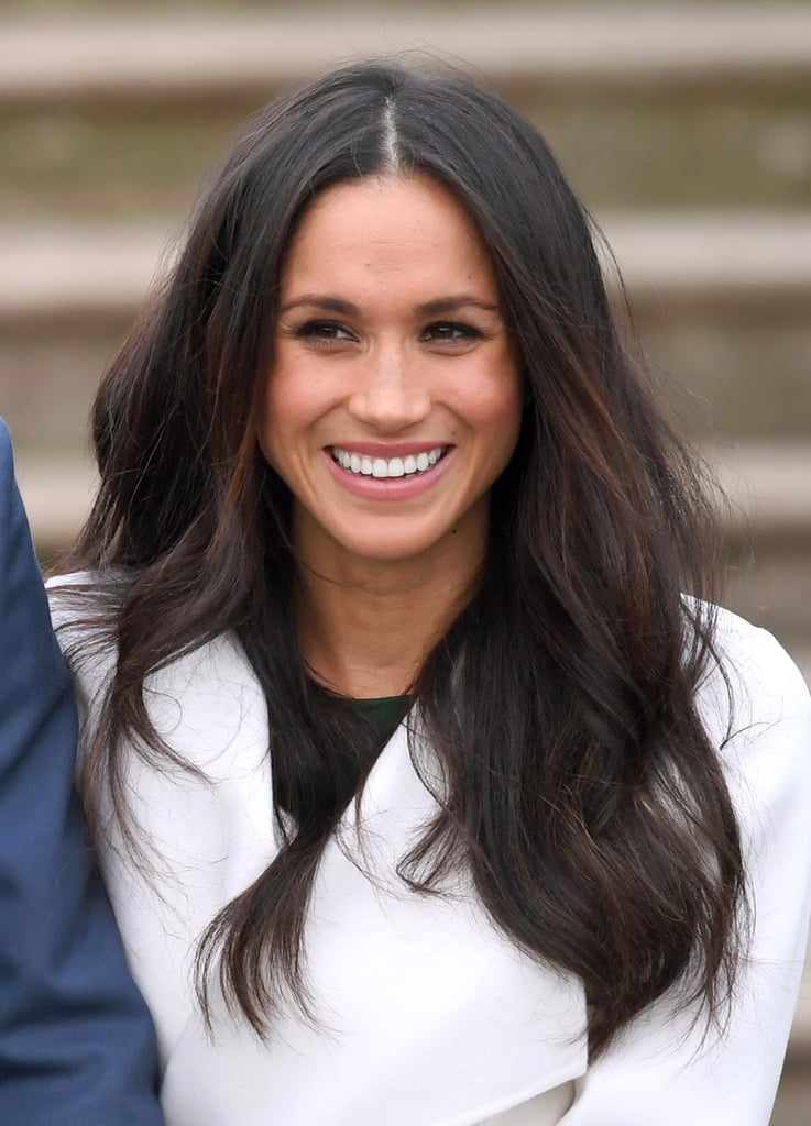 In this photo, Meghan was announcing her engagement, but by the looks of her brows, she could have also been announcing a remake of Breakfast at Tiffany's.
