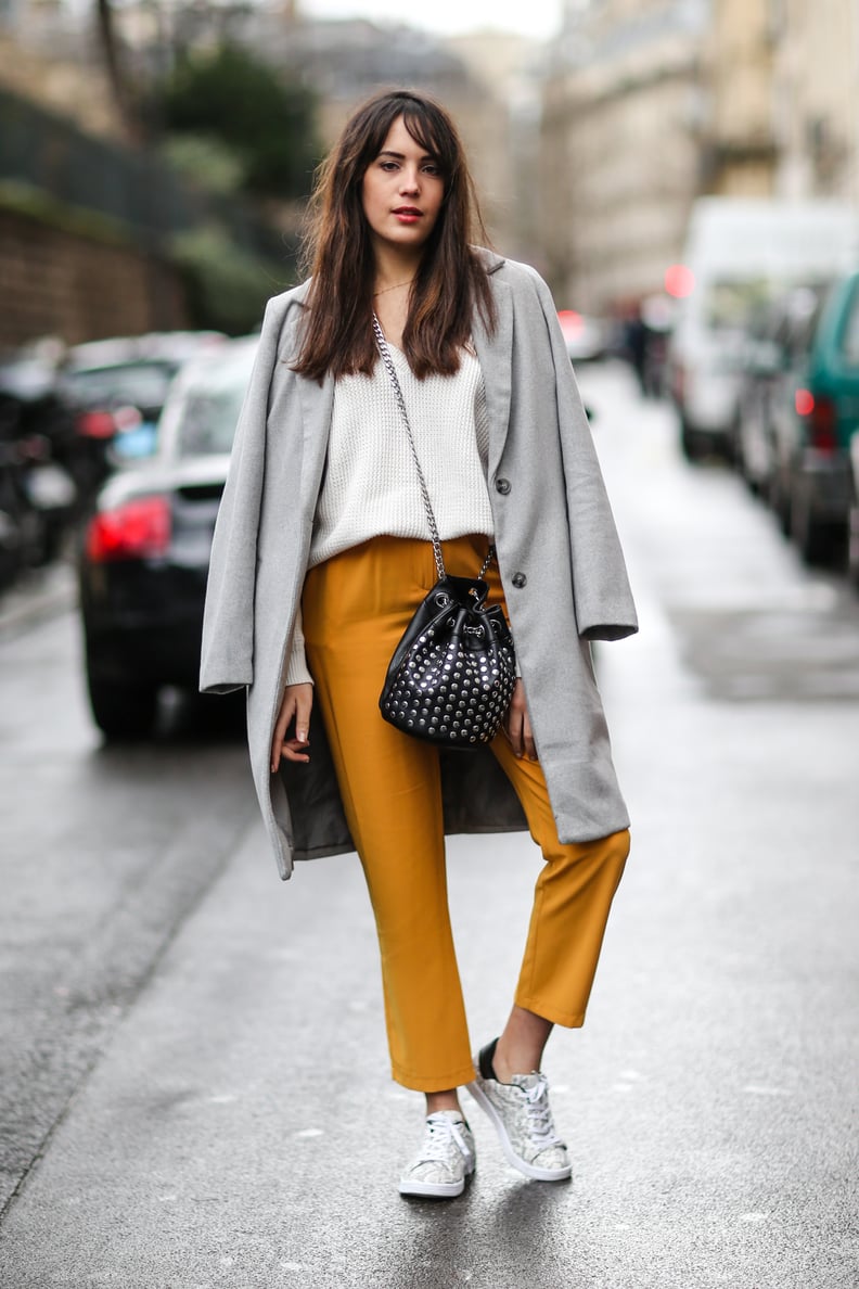Keep It Casual in White Kicks, Cropped Trousers, and a Structured Coat