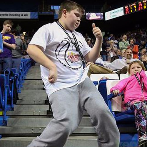Video of Boy Dancing to Happy at Basketball Game