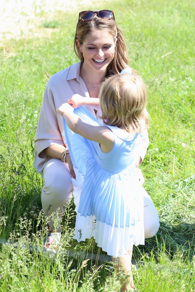 The royal mom couldn't contain her joy as she played in the grass with her daughter, Leonore, in 2016.