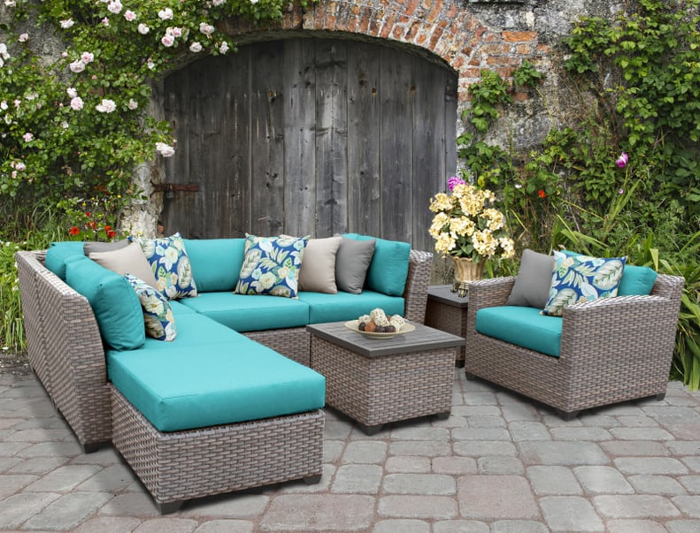 Merlyn 8 Piece Rattan Sectional Seating Group with Cushions